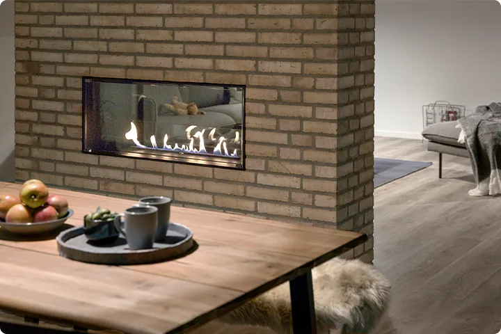Chimenea de bioetanol de 2 caras instalada entre salón y comedor