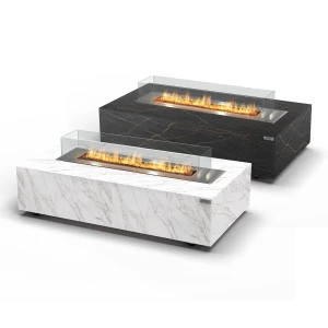 Mesa de mármol de Cosentino con quemador de bioetanol integrado de Planika. Mármol en acabado Daze (blanco) o Laurent (negro)