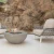 Mesa de bioetanol ROCA en color gris espacial de Elementi Fires, elegante y funcional para exteriores