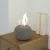 Paffu Chimenea Bioetanol de mesa gris de Elementi Fires, diseño compacto y portátil para espacios interiores y exteriores
