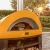 Horno de pizza de leña Moderno 5 Pizzas de Alfa Forni en color amarillo