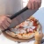 Cuchilla corta pizza de Alfa Forni en acero inoxidable con mango negro