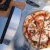 Cuchilla corta pizza de Alfa Forni en acero inoxidable con mango negro