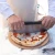 Cuchilla corta pizza de Alfa Forni en acero inoxidable con mango negro