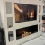 Foco One 1500 media wall chimenea de bioetanol empotrada con marco negro y cristal de seguridad.