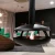 Chimenea de bioetanol de techo Perola Plus en color negro con diseño moderno y elegante.