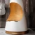 Chimenea de bioetanol Archimedes en color blanco, diseño moderno y elegante.