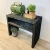 Mesa de láminas de madera negra de Kabeltromlen