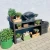 Mesa de láminas de madera negra de Kabeltromlen para uso exterior