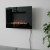 Chimenea eléctrica empotrada Raasay negra montada en la pared