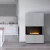 Chimenea Stone Kreta de Planika con acabado en Dekton. La chimenea está cerrada con vidrio templado.