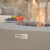 Mesa de bioetanol ROCA en color gris espacial de Elementi Fires, elegante y funcional para exteriores