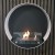 La biochimenea de forma circular en blanco para la pared