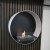 La biochimenea de forma circular en blanco para la pared