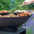 Onyx Ø80 brasero con parrilla y almacenamiento de leña  